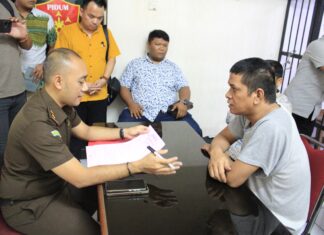 Tersangka TS, Pelaku Kerusuhan di Harjamukti Tahap Dua di Kejari Depok