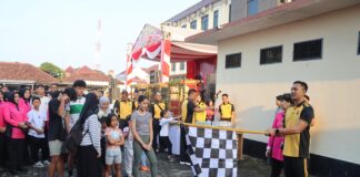 Polres Demak Rayakan Hari Bhayangkara Ke-79 Dengan Jalan Sehat