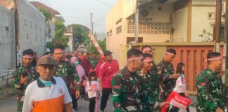 Semarakkan HUT RI Ke-80, Satgas TMMD Reguler Ke-125 Kodim 0735/Surakarta Laksanakan Gerak Jalan Dan Senam Bersama