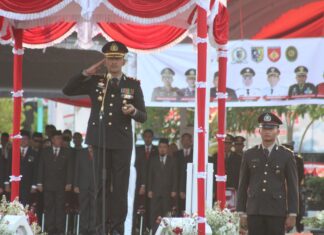 Kapolres Demak Pimpin Upacara Penurunan Bendera HUT RI Ke-80
